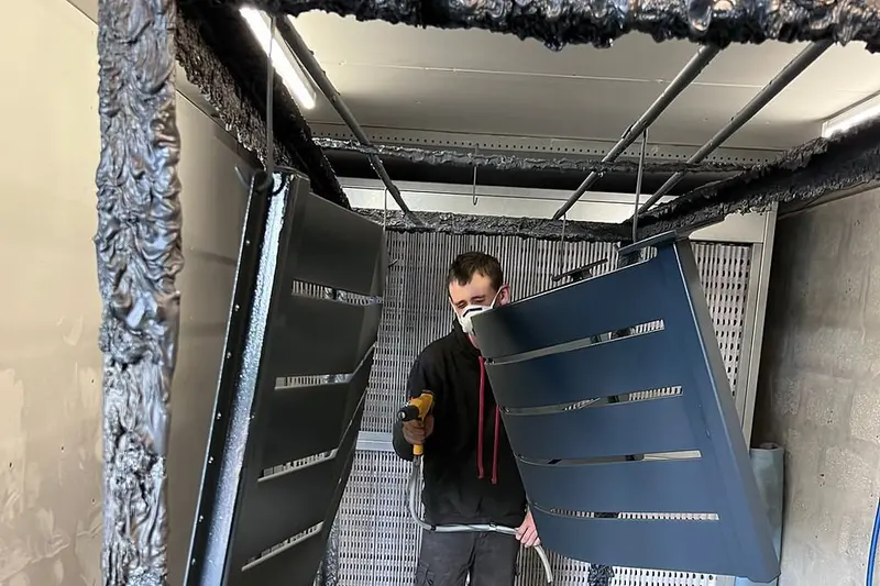 Gate panels being powder coated in the spray booth Mid Cornwall Powder Coating Bodmin
